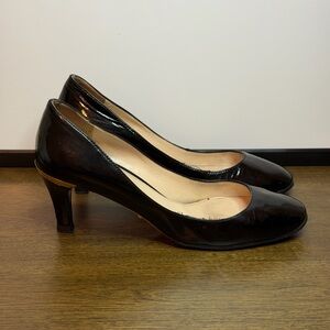 Prada Black Patent Leather Pumps with a Gold-tone Heel Accent Size 36.5